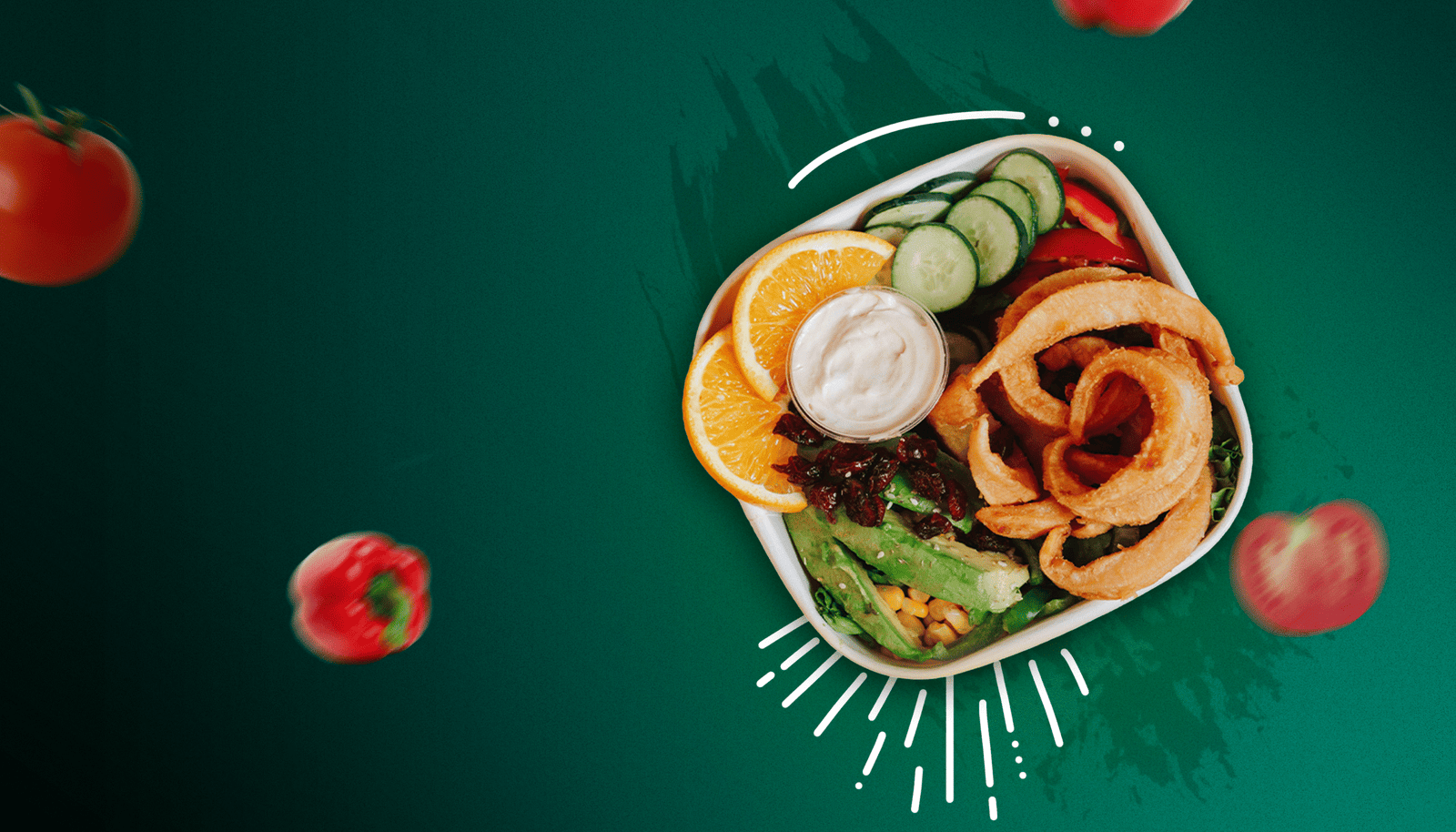 A colourful salad bowl of fresh vegetables and greens