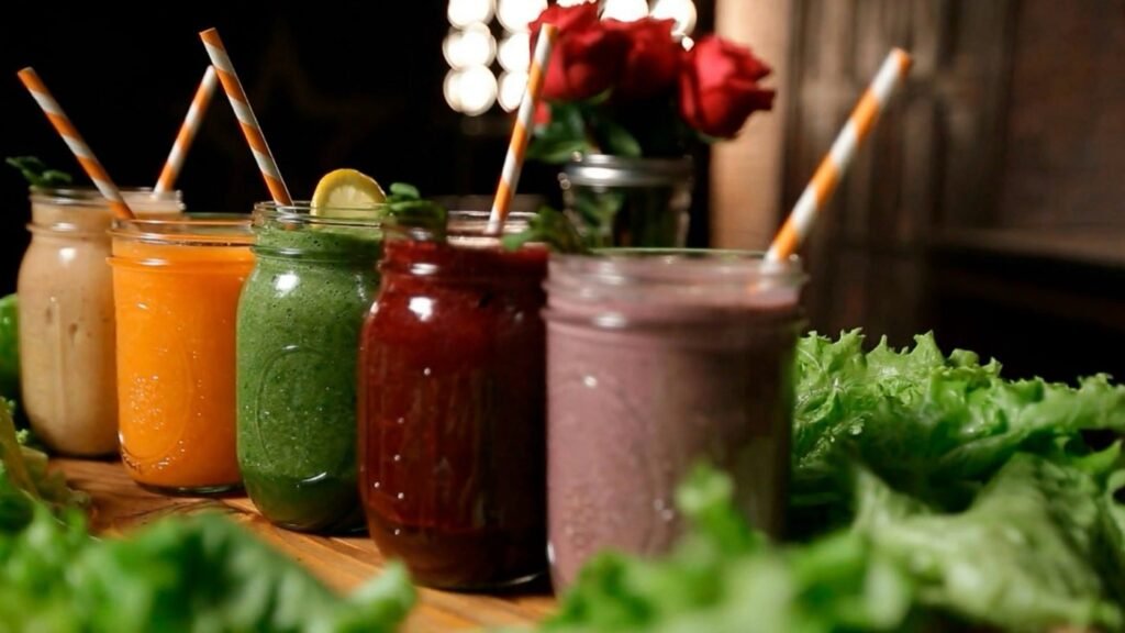 Six Greenfork juices in jars, set out together for a shared breakfast